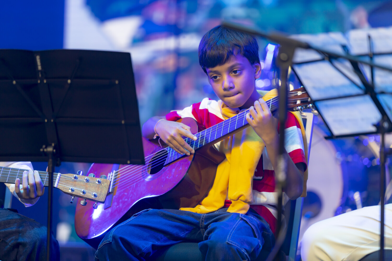 Guitar student first performance on big stage at Menara Ken TTDI