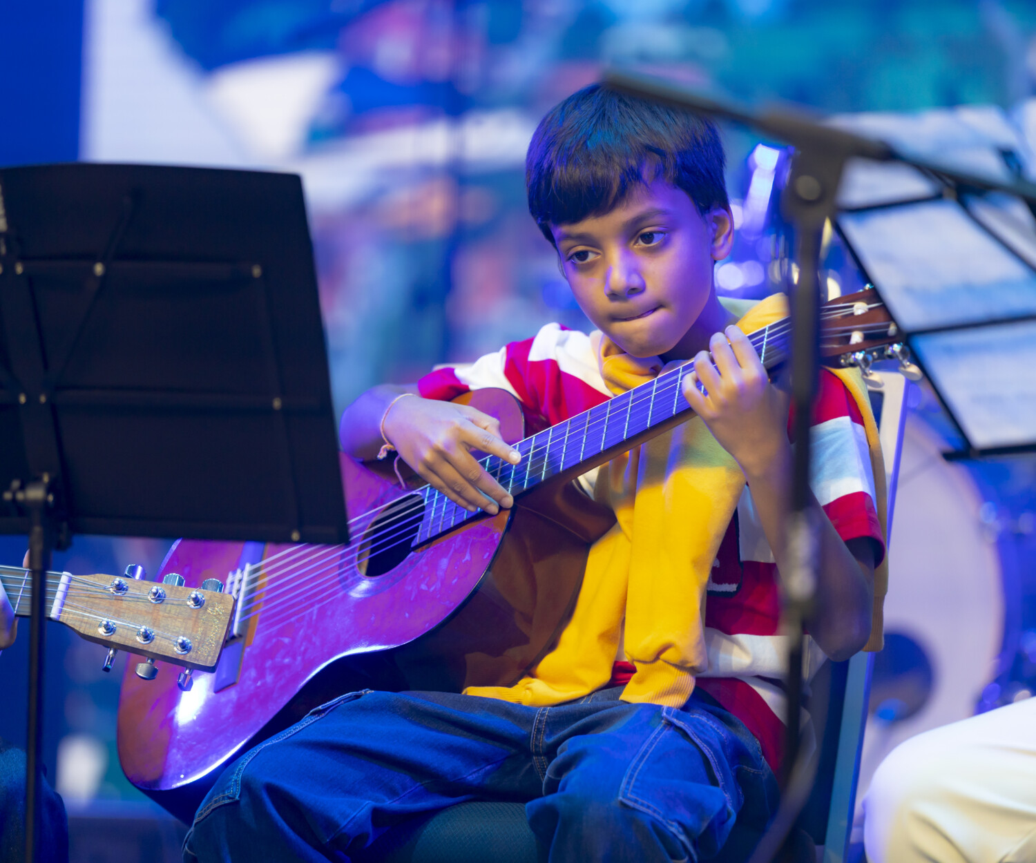 Guitar student first performance on big stage at Menara Ken TTDI